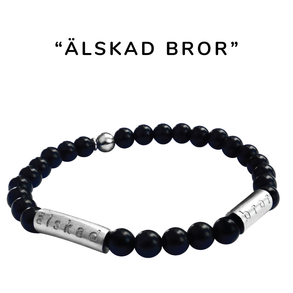 Snyggt elastiskt armband i matt svart halvädelstenen onyx och borstad stål