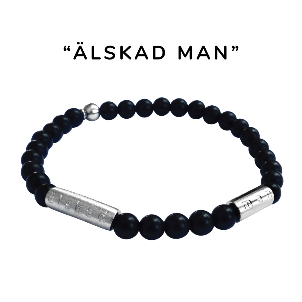 Snyggt elastiskt armband i matt svart halvädelstenen onyx och borstad stål