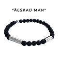 Snyggt elastiskt armband i matt svart halvädelstenen onyx och borstad stål