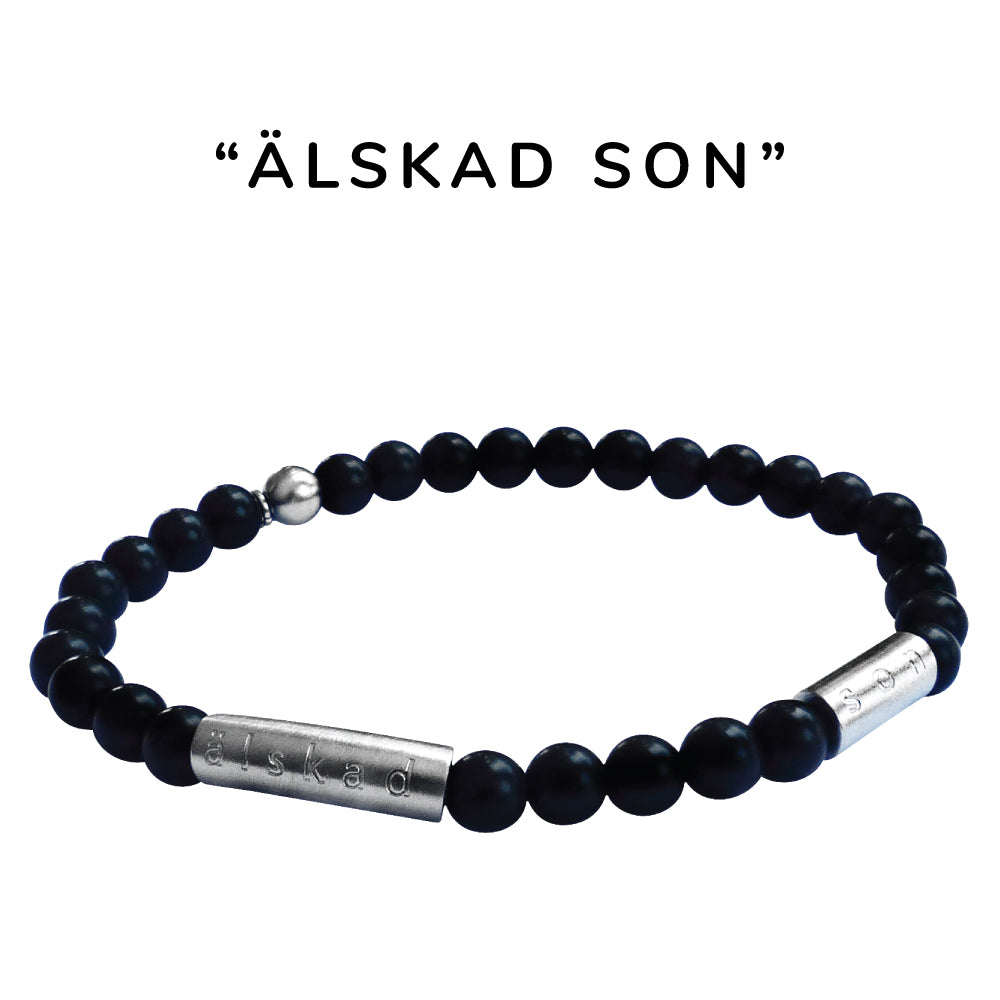 Snyggt elastiskt armband i matt svart halvädelstenen onyx och borstad stål