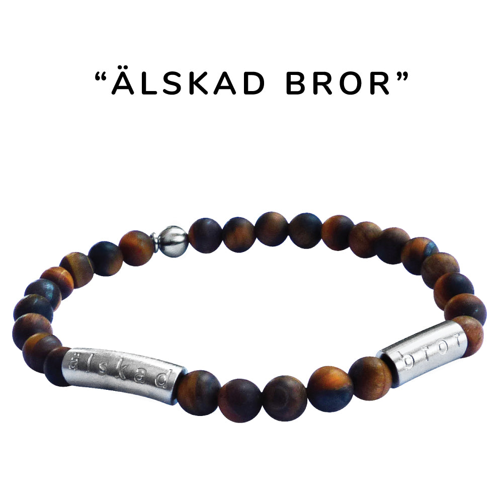 Snyggt elastiskt armband i brunmelerad halvädelsten Tigeröga och borstad stål med text