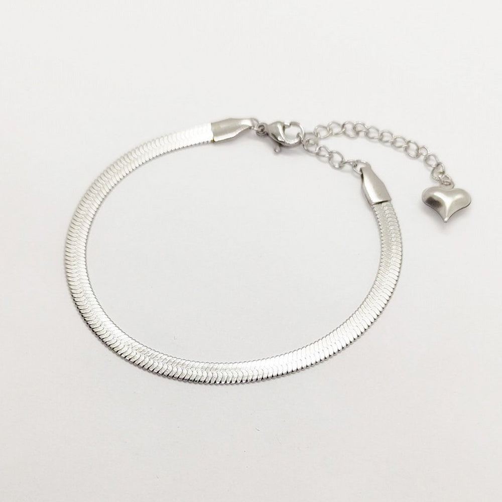Exklusiv fotlänk / vristlänk med platt ormkedja som skönt följer vristen. 22,5cm +5cm