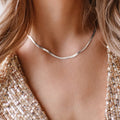 Elegant platt 3mm ormkedja som följer halsen mjukt. Perfekt halsband / kedja att kombinera med andra!