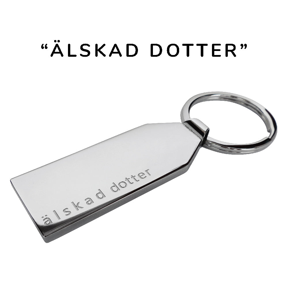 Stilren personlig nyckelring i polerat rostfritt stål med färdig-graverad text